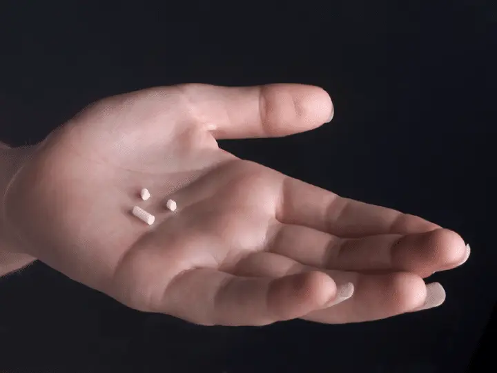 hormone pellets in hand