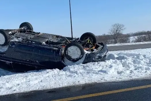 upside down car driving in snow